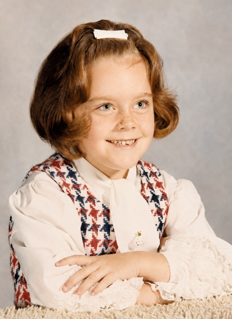 Renee at age six in her first-grade school portrait, 1971.
