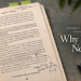 Open book with highlighted and underlined passages, handwritten notes, arrows, and annotations in the margins.