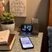 Bedside table at 3:20 a.m. with a Bible, biblical counseling book, and phone displaying a Meowdoku puzzle beside the bed.