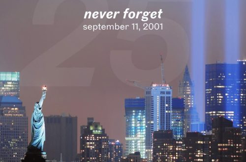 Statue of Liberty and New York City skyline with the Tribute in Light, commemorating the 25th anniversary of September 11, 2001.